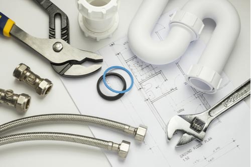 Plumbing tools and fittings concept of plumbers in Davie Florida
